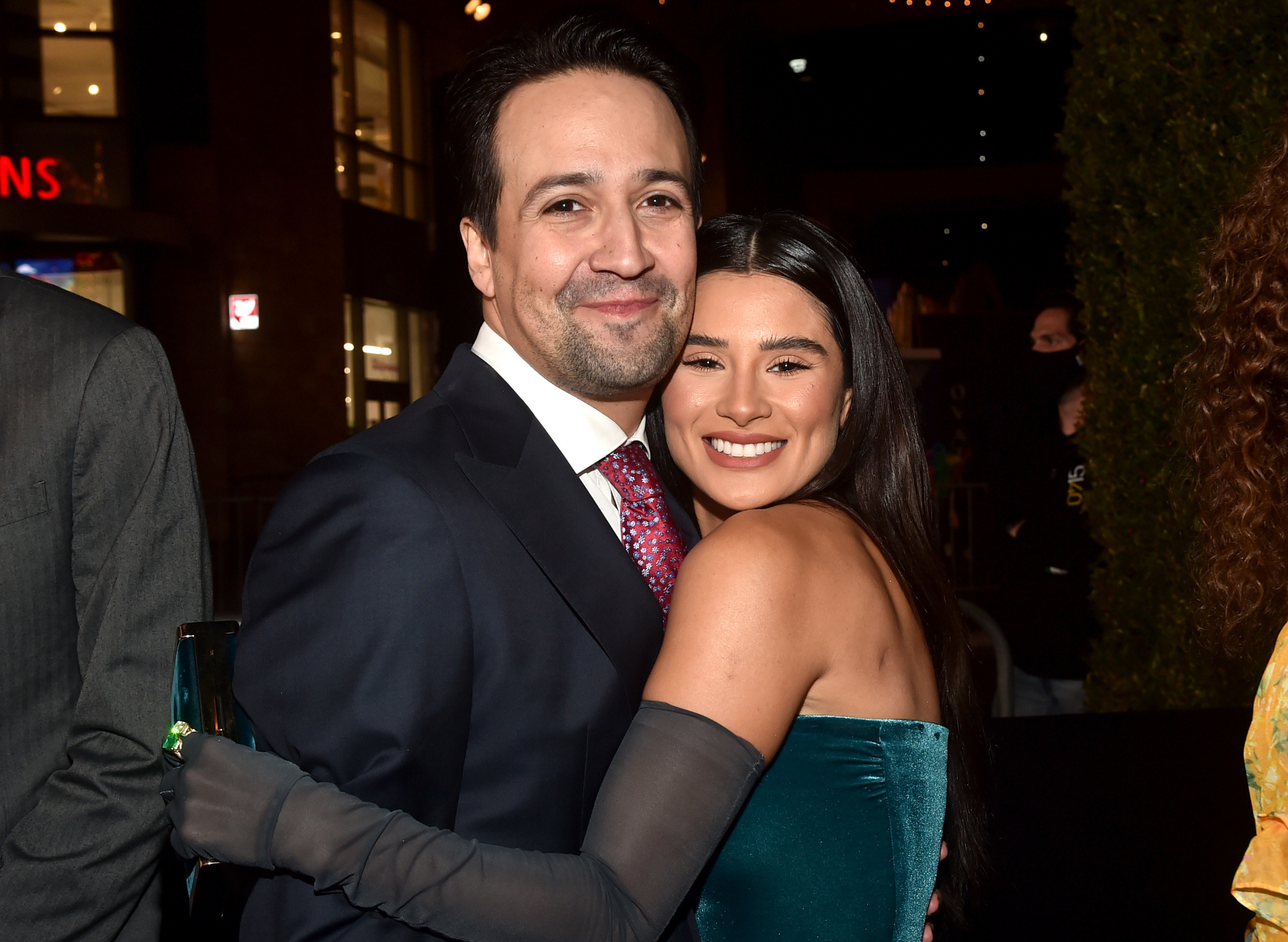 Lin Manuel Miranda and Diane Guerrero embracing at the premiere of Encanto