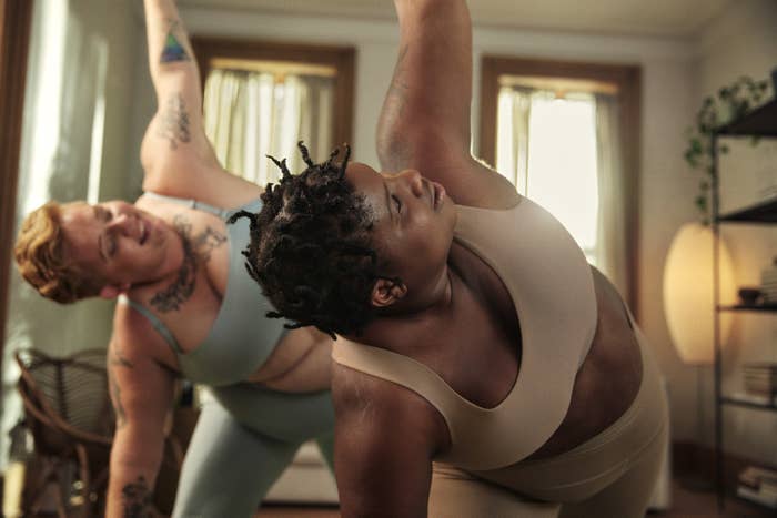 two women doing yoga