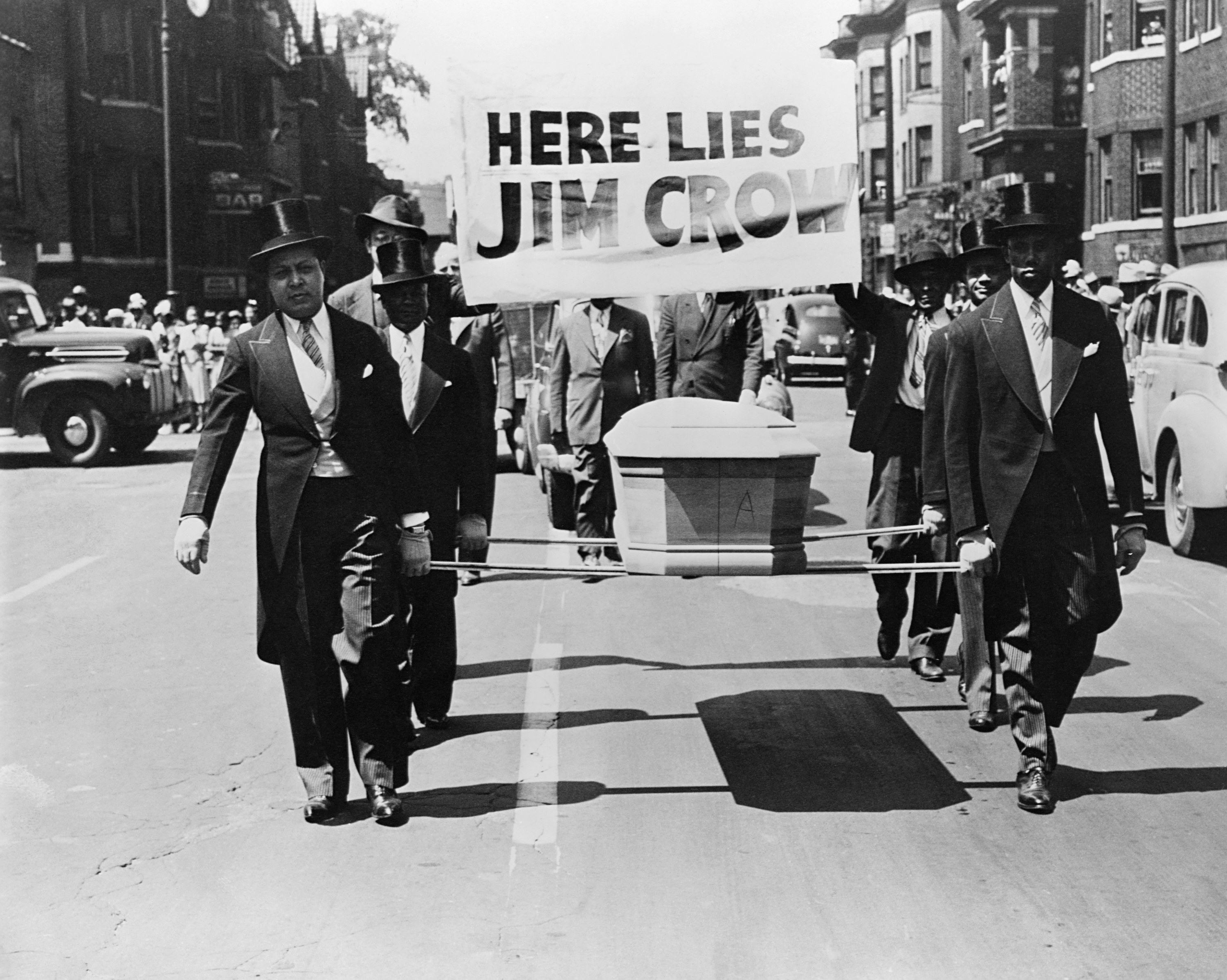 men marching with casket