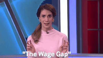 A woman saying &quot;the wage gap&quot; and using air quotes
