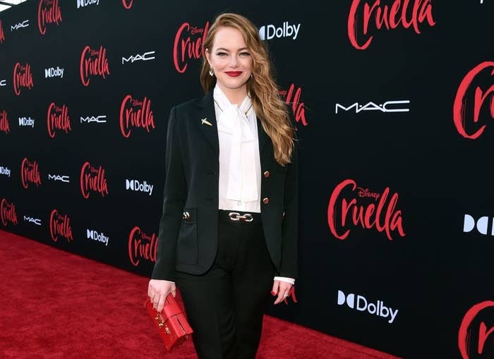 Emma is wearing a pantsuit at the Cruella premiere