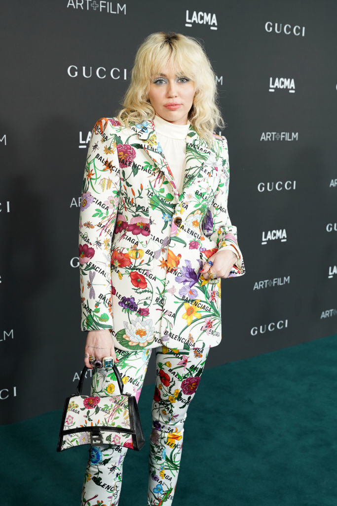 miley is in head-to-toe gucci at a gucci event