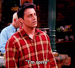 GIF of Joey from Friends making air quotes and saying, &quot;I&#x27;m sorry&quot;
