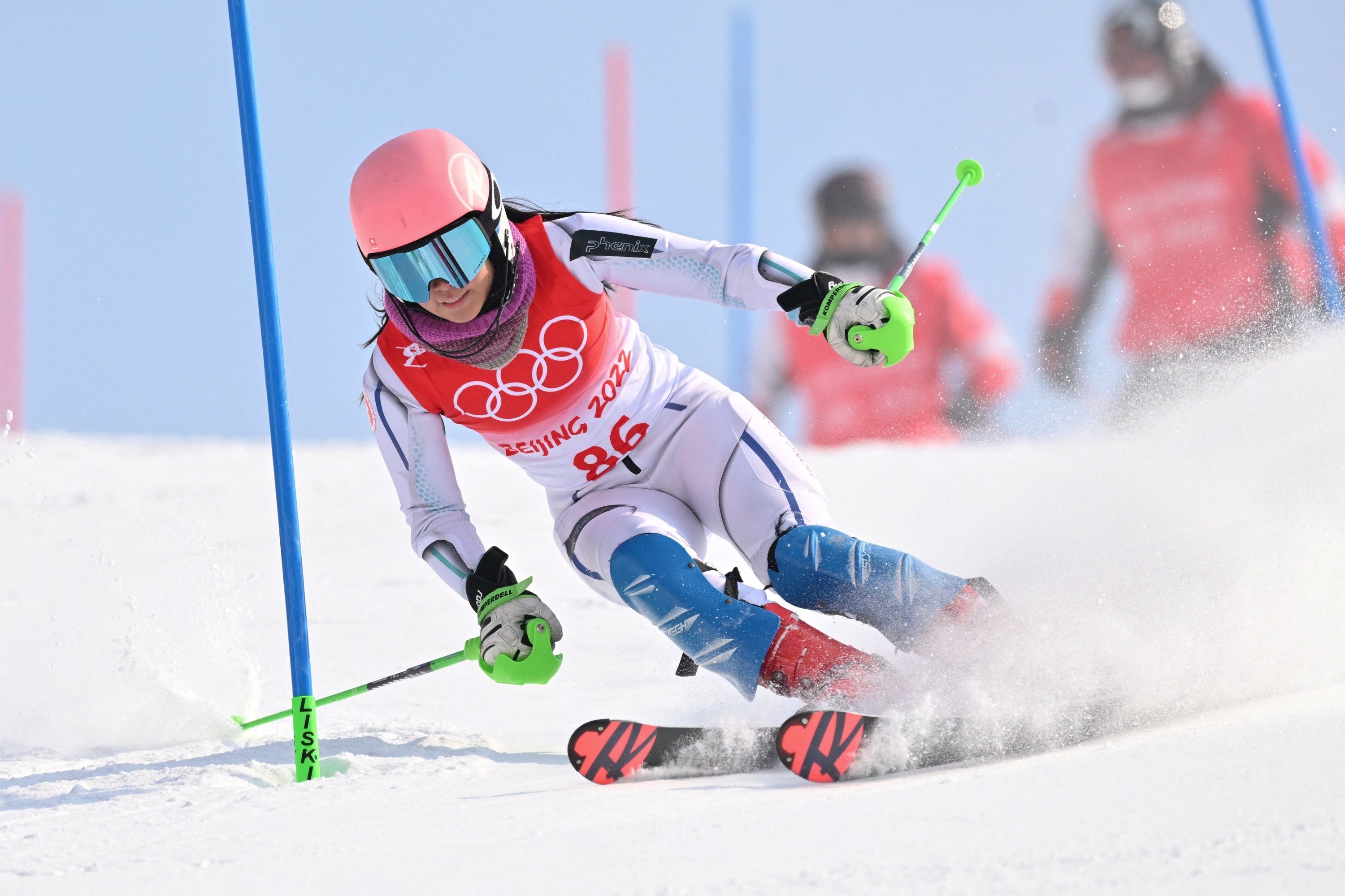 An athlete skiing down a mountain