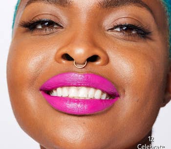 model wearing bright pink lipstick