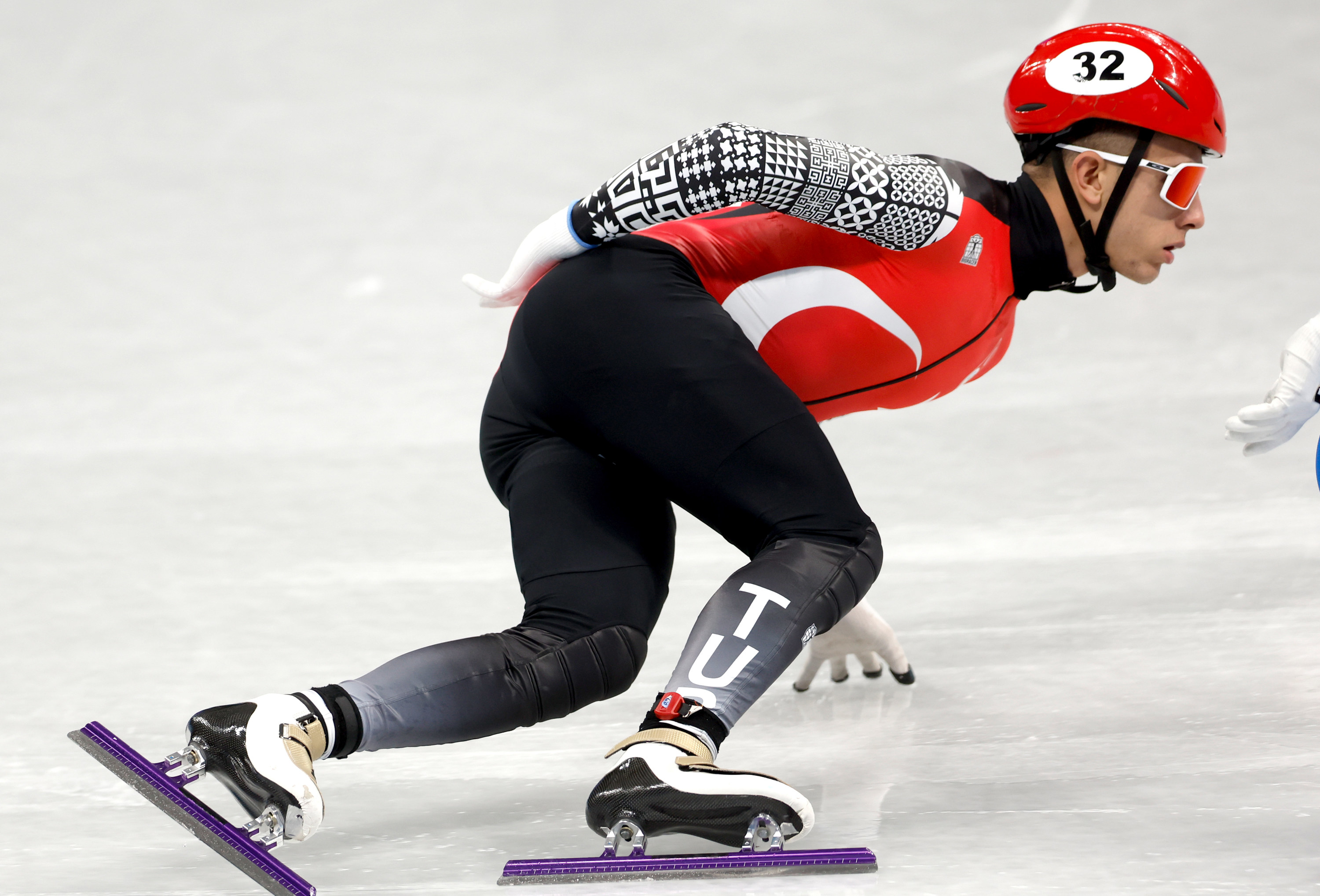 A Turkish athlete participating in speed skating