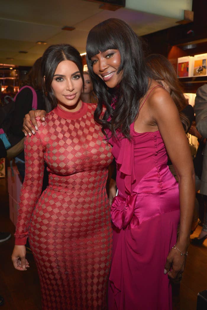 Kim and Naomi posing for a photo at an event