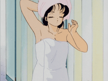 A gif of an animated person whipping a towel off their hair and releasing their long locks