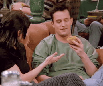 Chandler licking a muffin