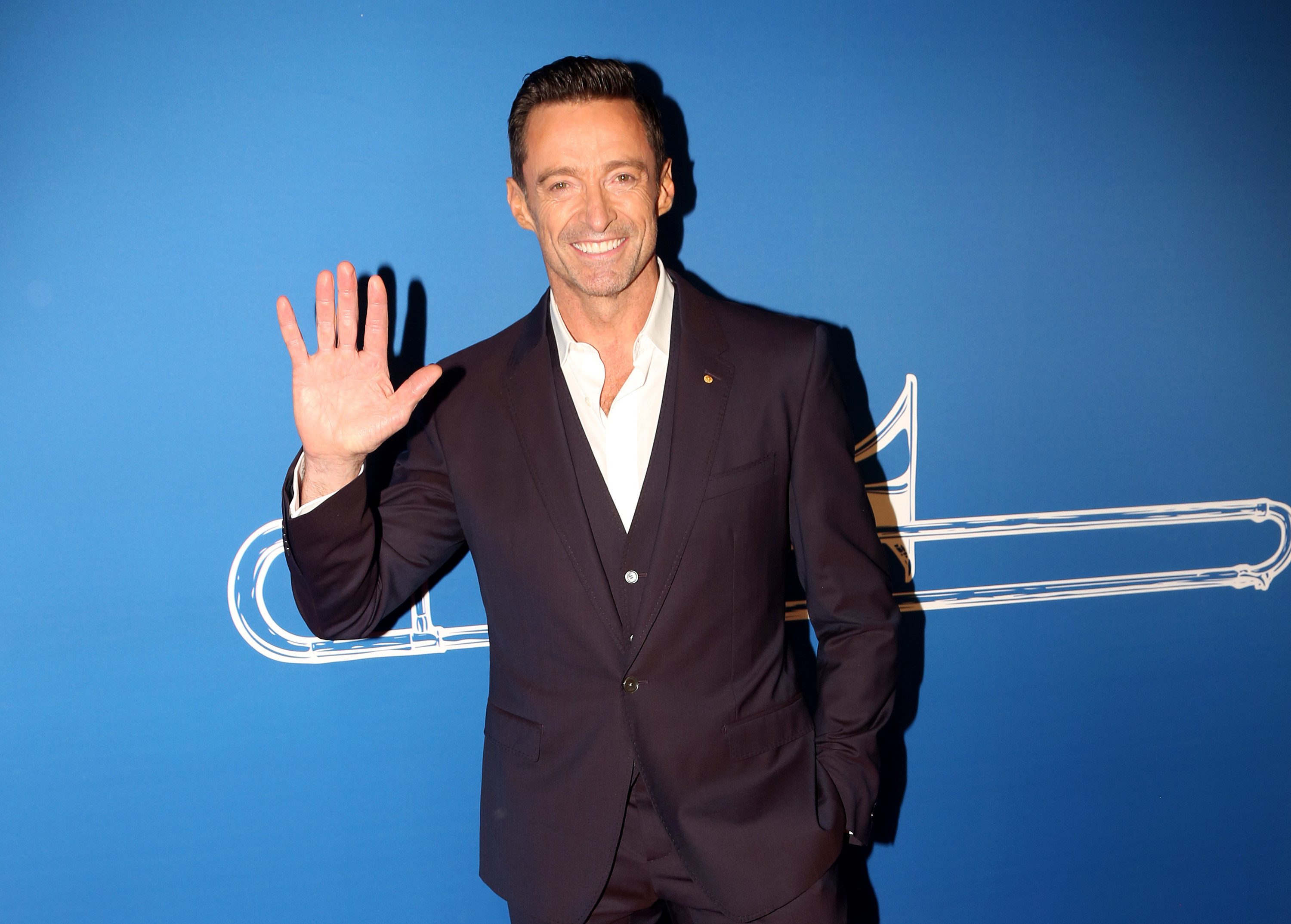 Hugh Jackman decorates his living room for Christmas with a cardboard Ryan  Reynolds