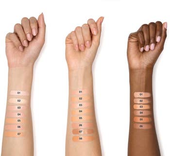 three models' arms with swatches of the different under eye corrector shades