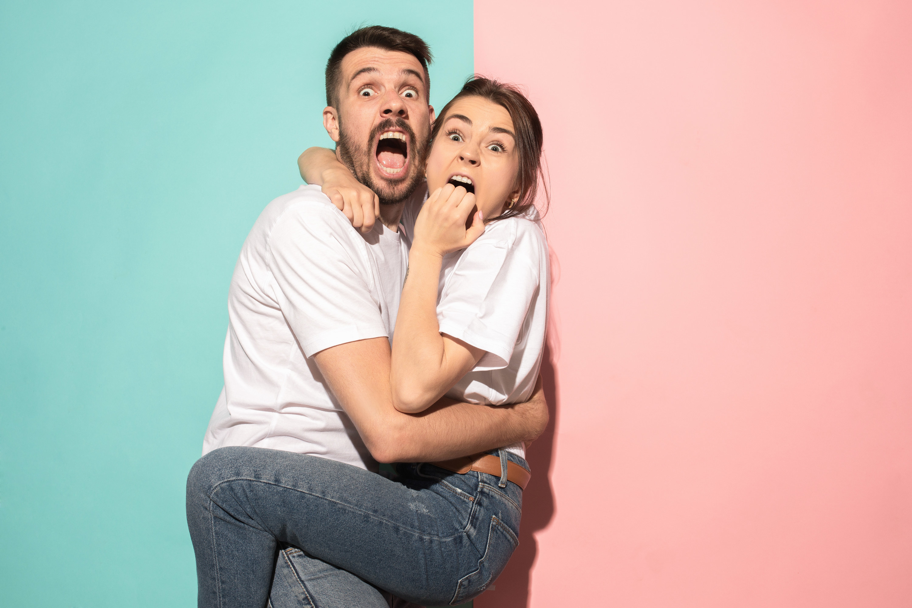 Couple looking shocked