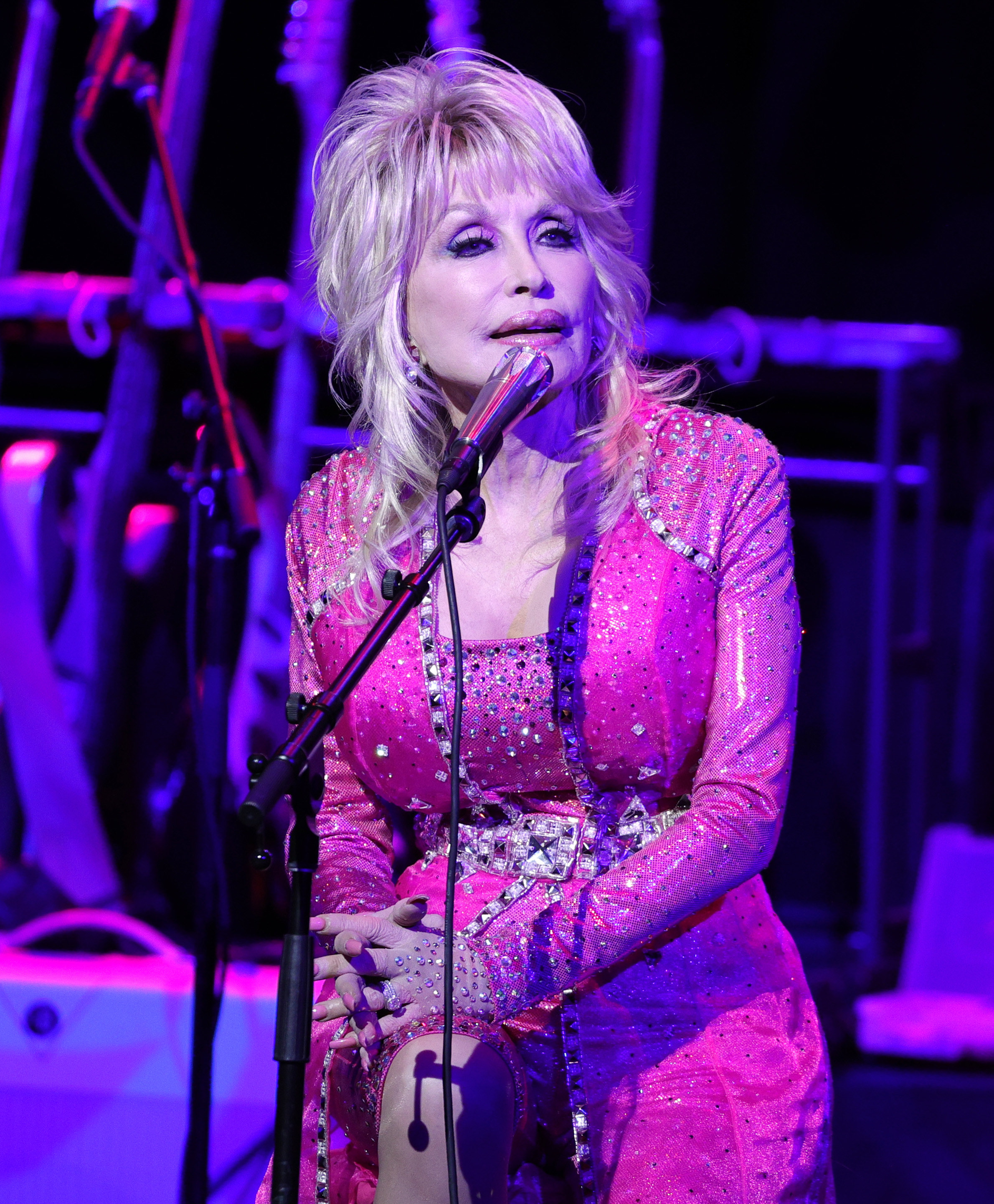 Dolly Parton sings on stage at the 2021 Kiss Breast Cancer Goodbye Concert on October 24, 2021