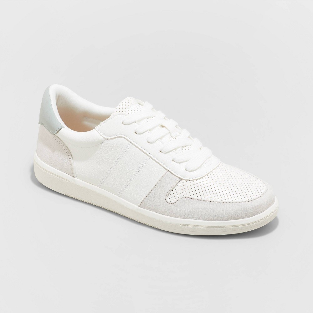 A white sneaker with perforated detailing