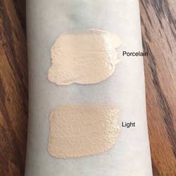 reviewer's arm with two swatches of the tinted hydrator to compare shades and show its texture