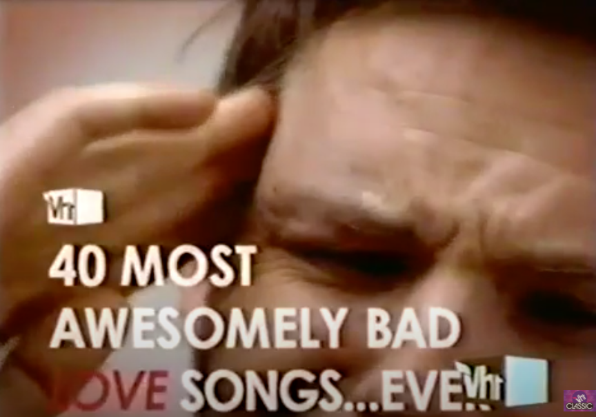 man with fingers on his temple as 40 most awesomely bad love songs...ever is across screen