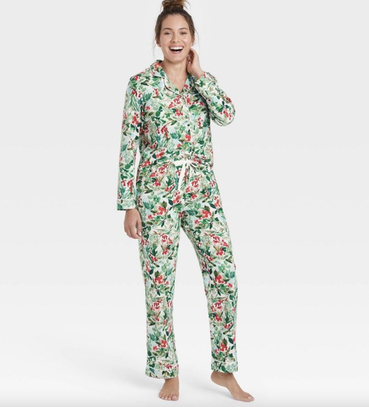 A person wearing a floral pajama set