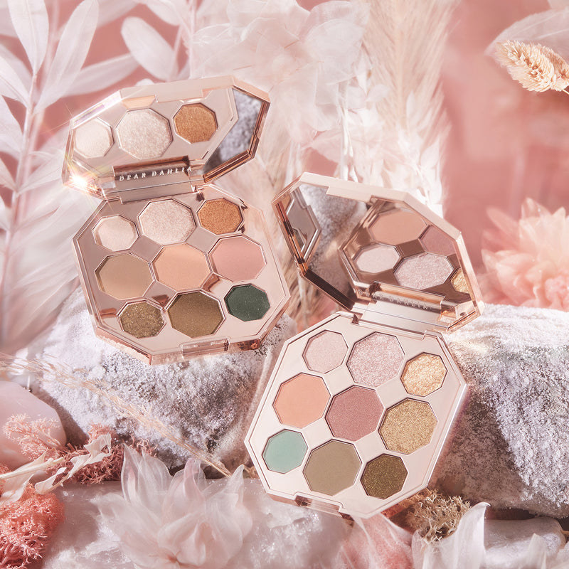 the eyeshadow palette that has colors like brown gold pink green and more in a muted tone