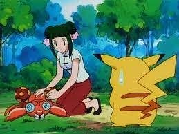 A fainted Paras with their trainer and Pikachu