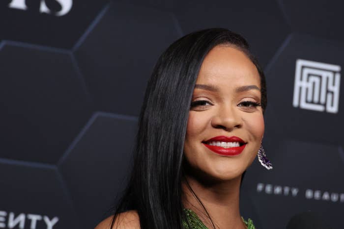 Rihanna smiles for the camera