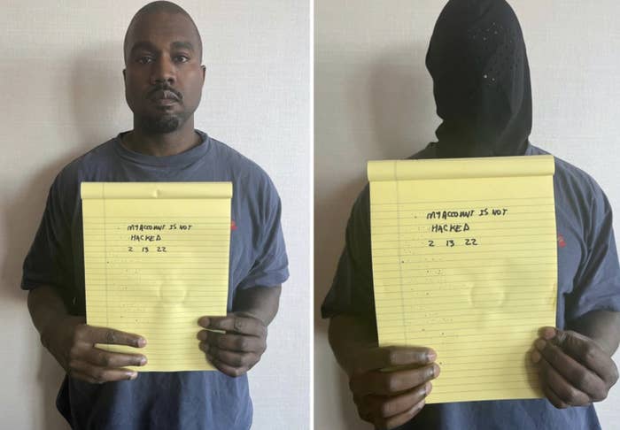 Kanye holding up a notebook to prove he wasn't hacked