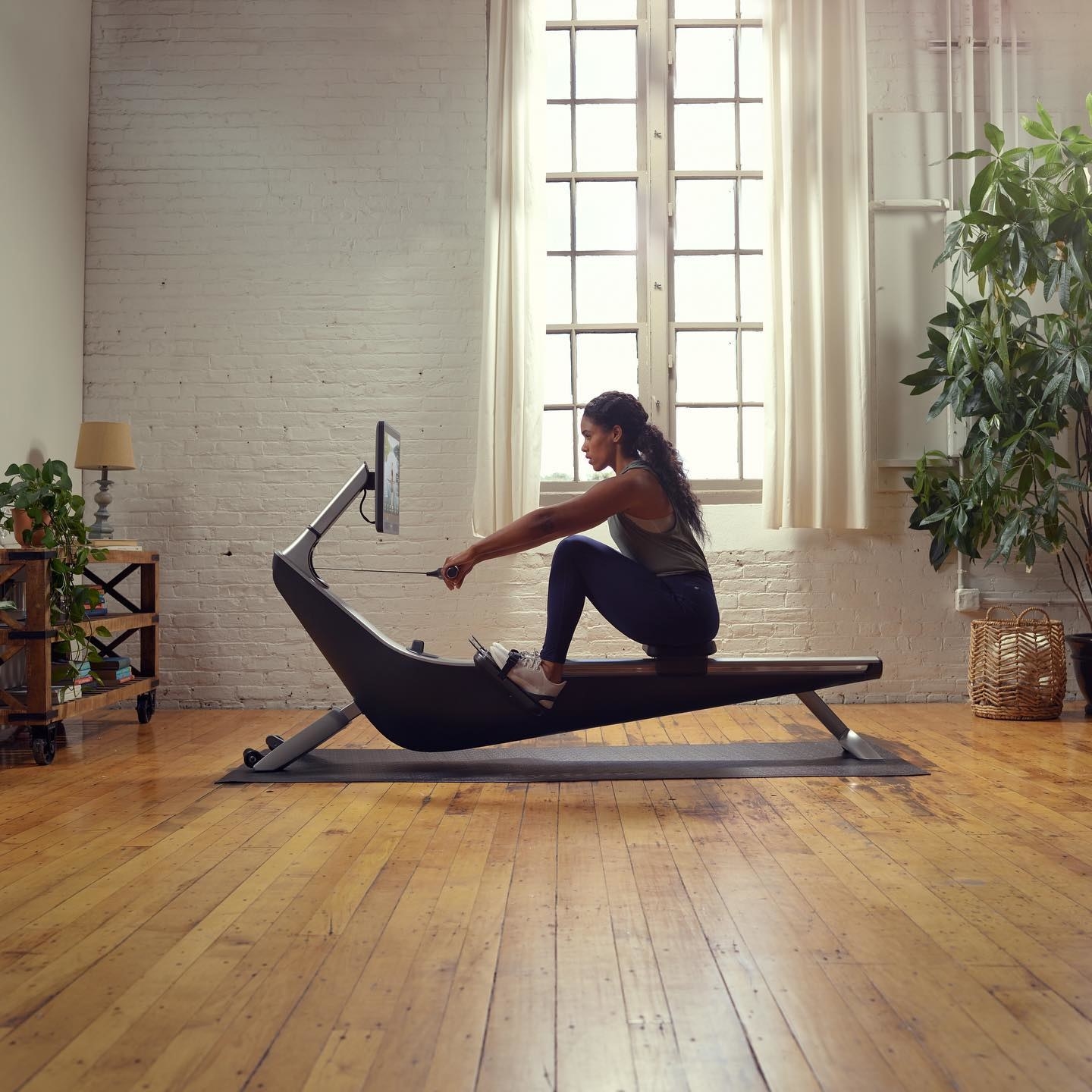 a model using the rowing machine