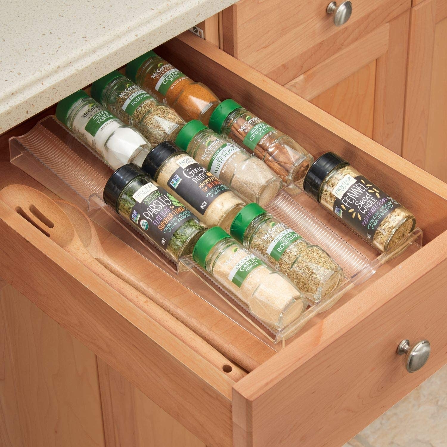 Several spice bottle in the organizer