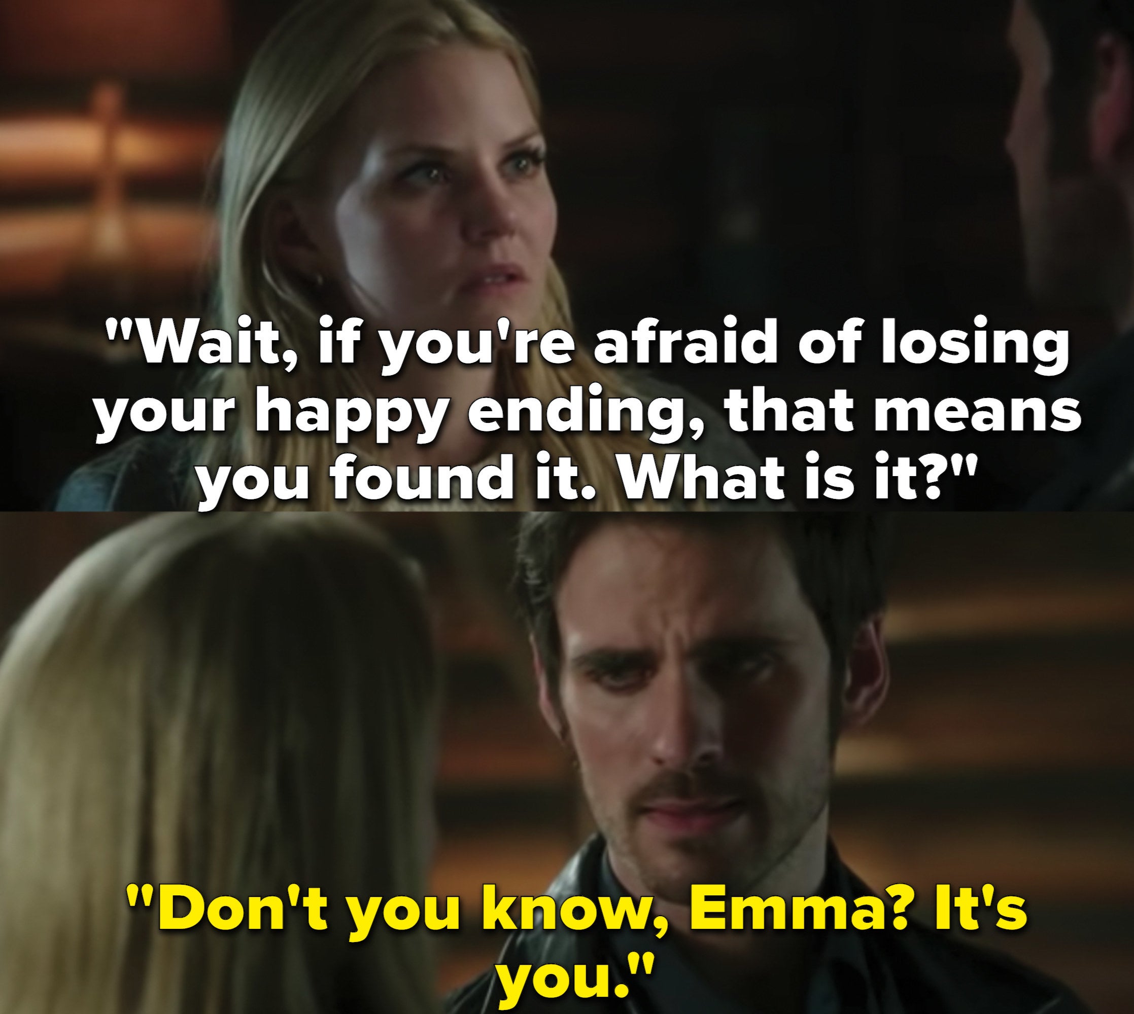 A close up of Killian Jones and Emma Swan as they speak closely to each other