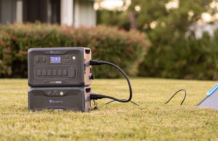 Bluetti generator sits outside on a lawn