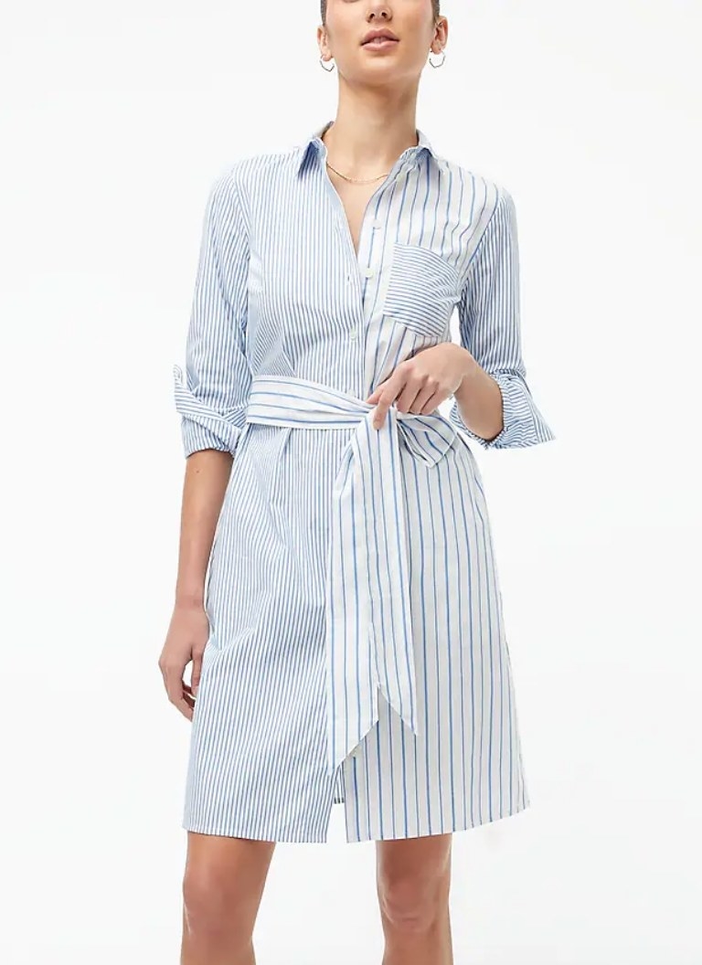 A blue/white striped belted shirtdress