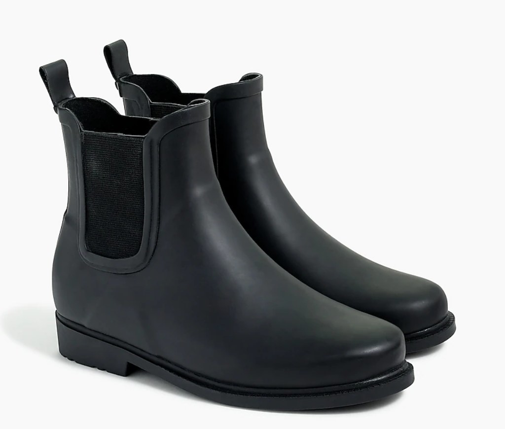 A pair of black Chelsea rain boots