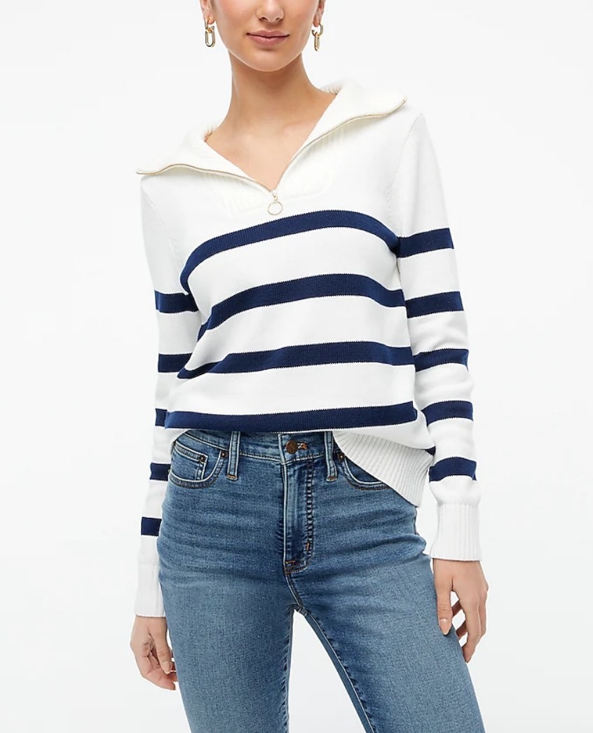 A model wearing a nautical stripe wide collar three-quarter zip sweater