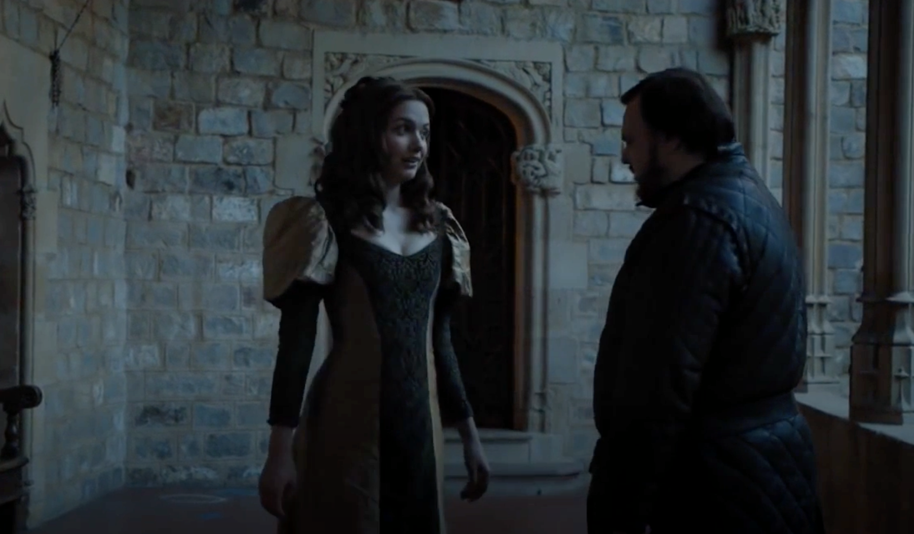 Sam and Gilly have a conversation in a castle