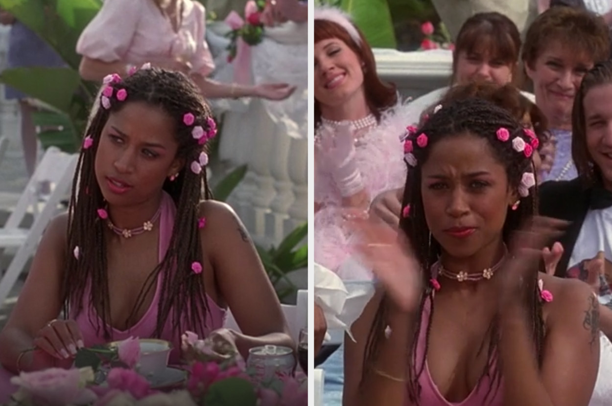 Dionne wears a pink gown and pink floral hair accessories at Mr. Hall and Miss Geist&#x27;s wedding