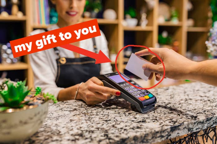 Swiping a credit card with text: &quot;My gift to you&quot;
