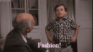 A gif of a person saying &quot;fashion&quot; and posing