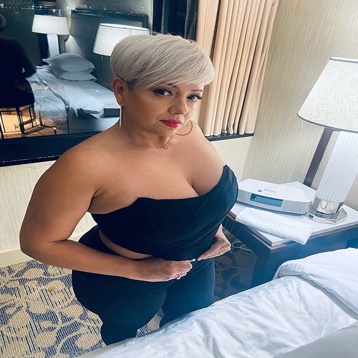 Reviewer wearing the black strapless bustier corset top