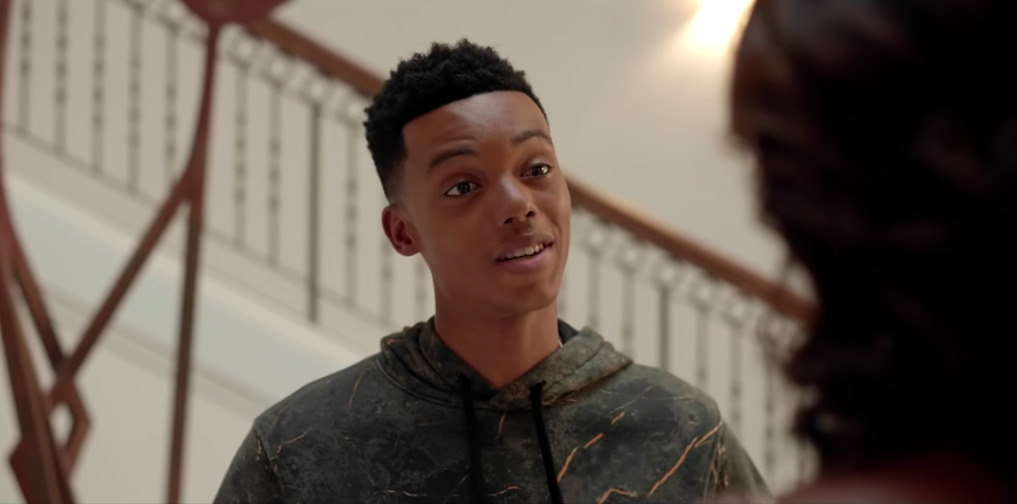 A closeup of Will talking to someone
