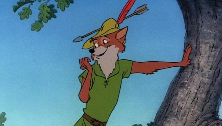 Robin Hood leans against a tree as an arrow is stuck through this hat