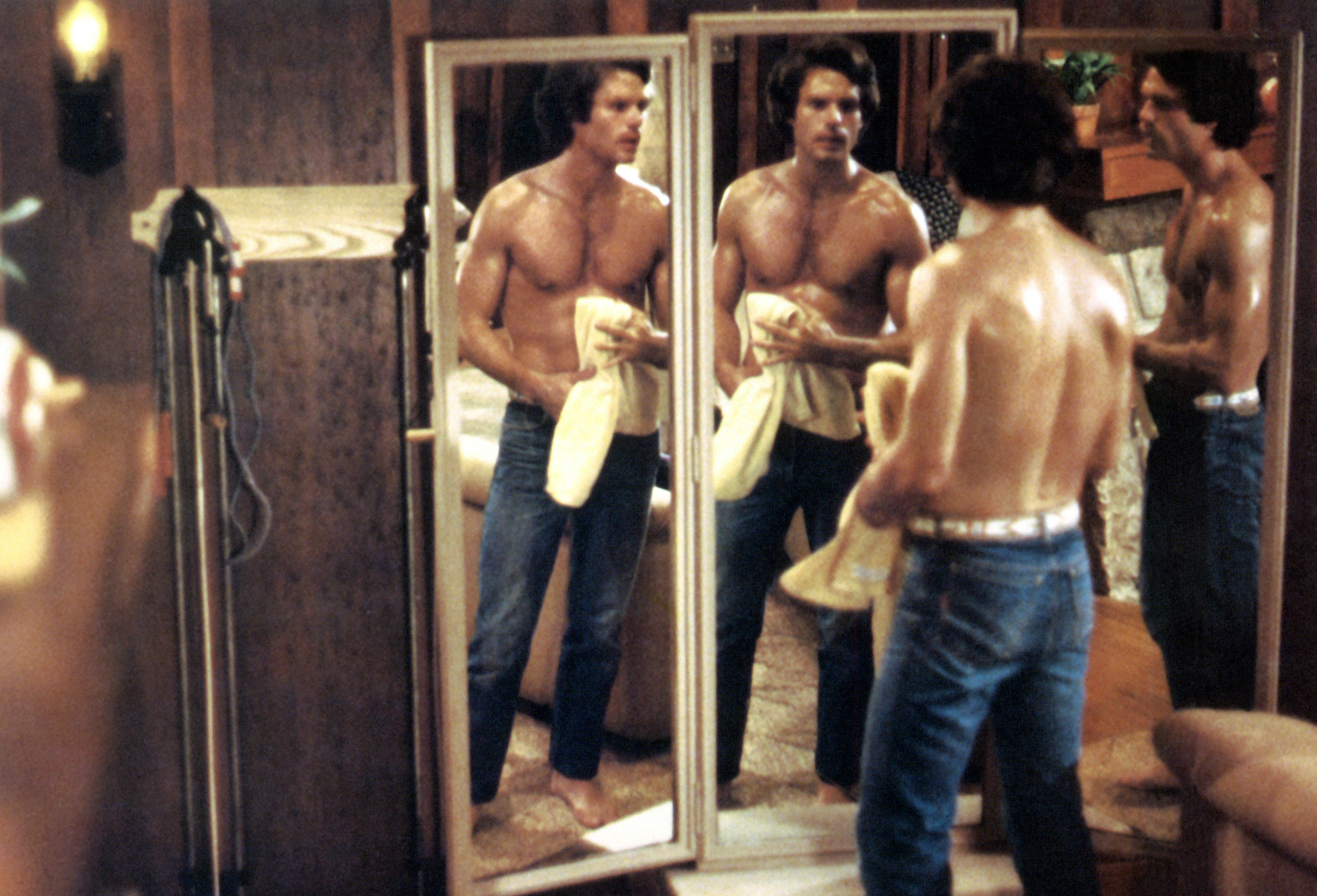 Hamlin in front of the mirror shirtless