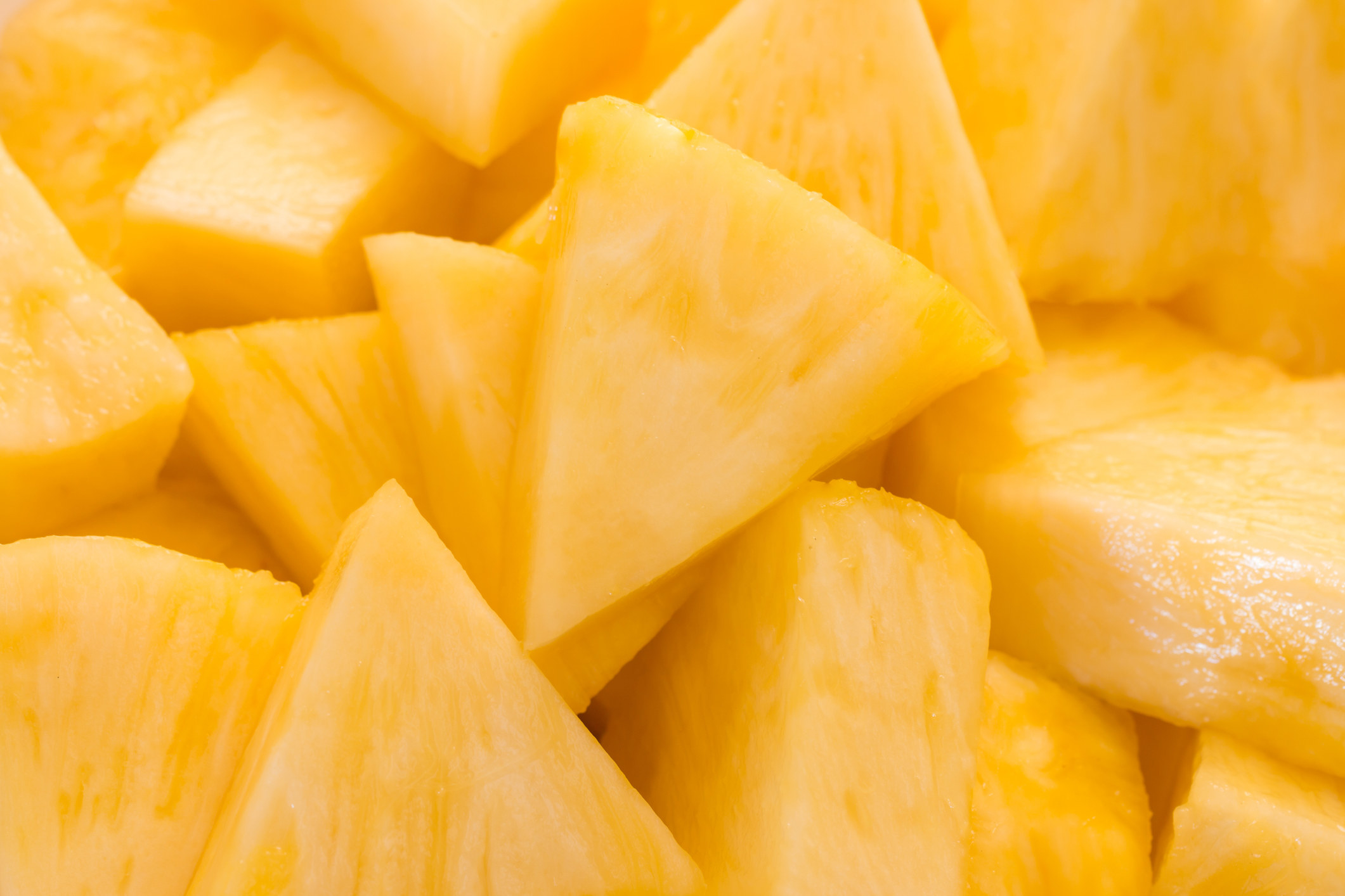 Sliced pineapple triangles.