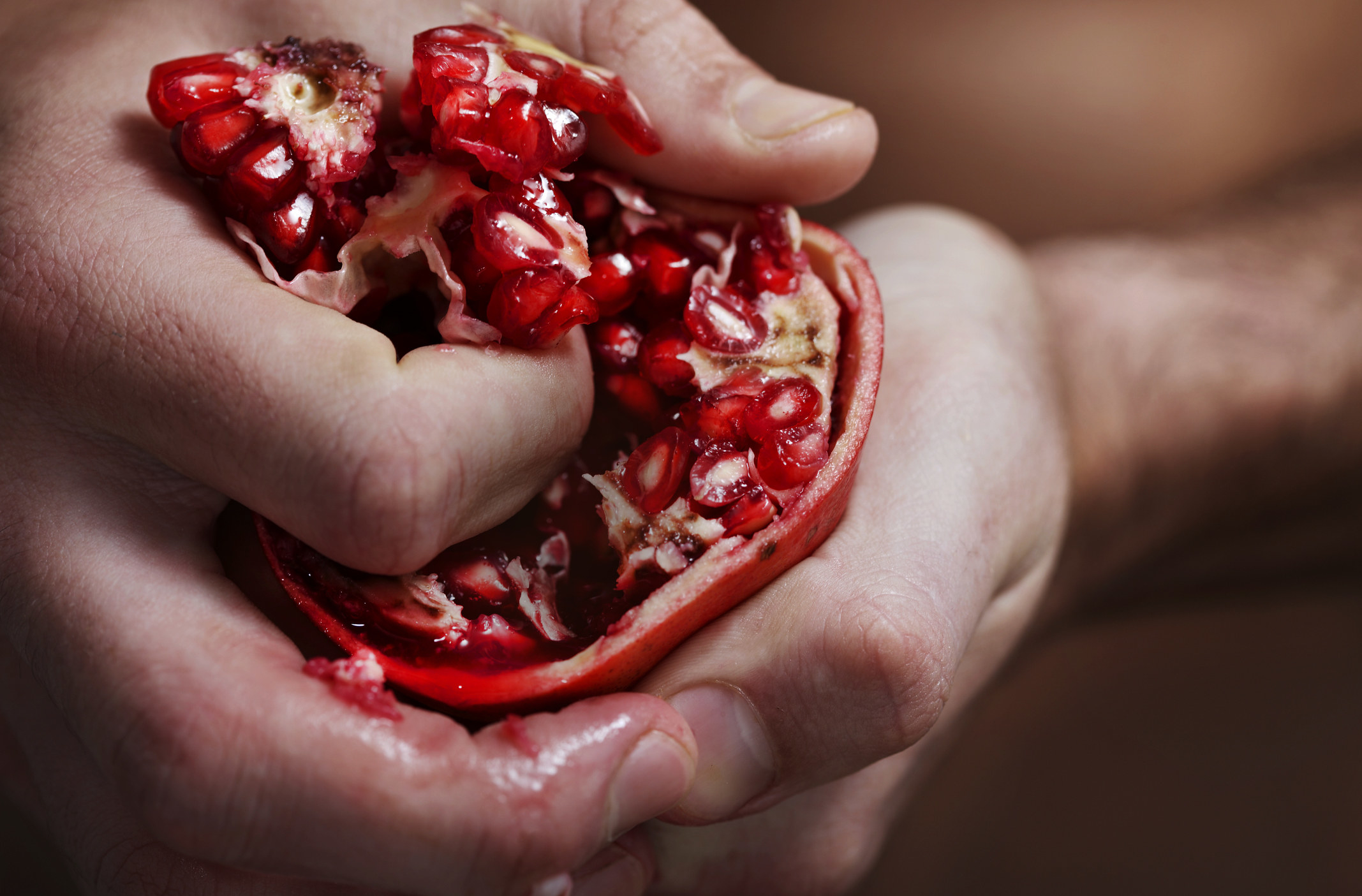 Peeling a pomegranate.