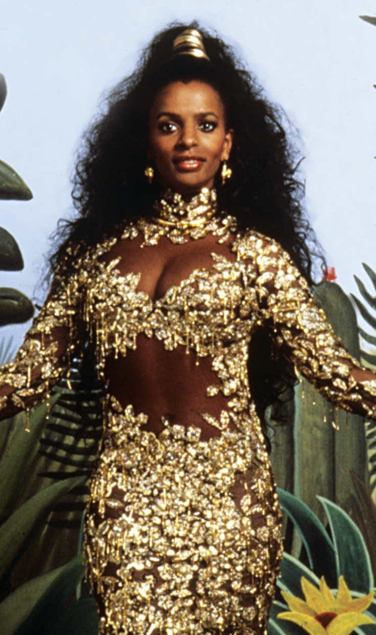 Calloway wearing her iconic golden dress