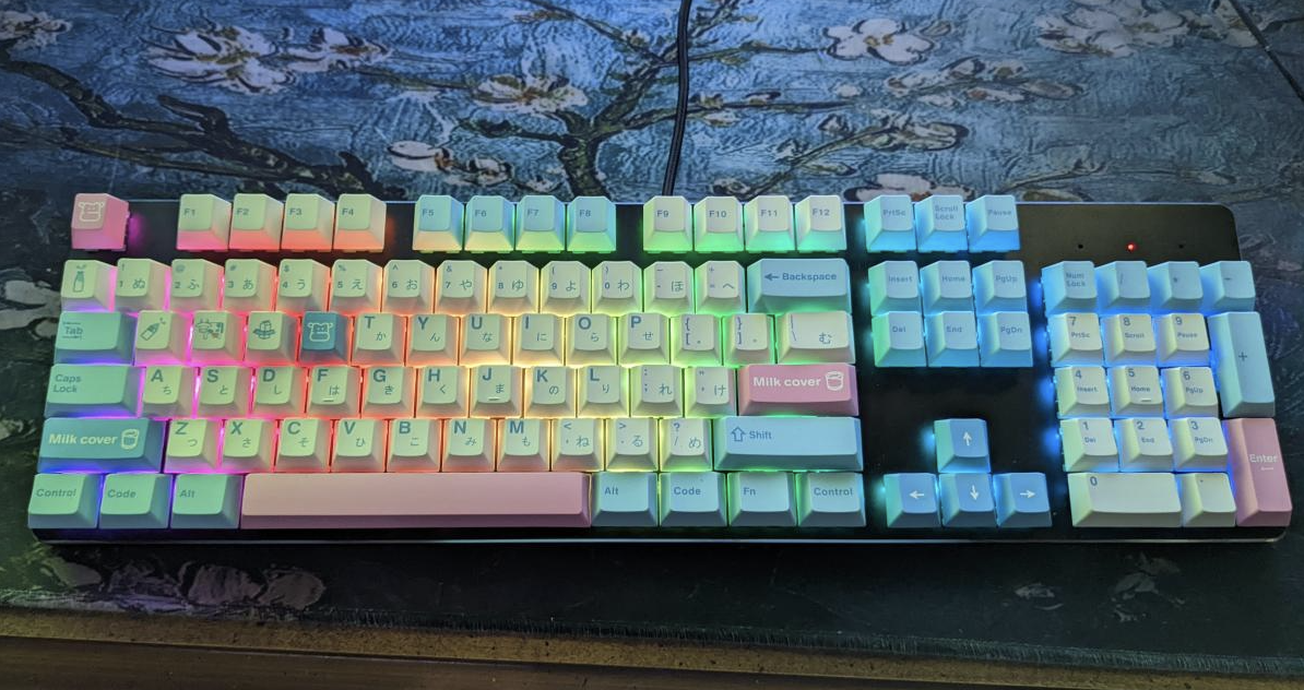 Cece&#x27;s keyboard with the milk-themed keycaps