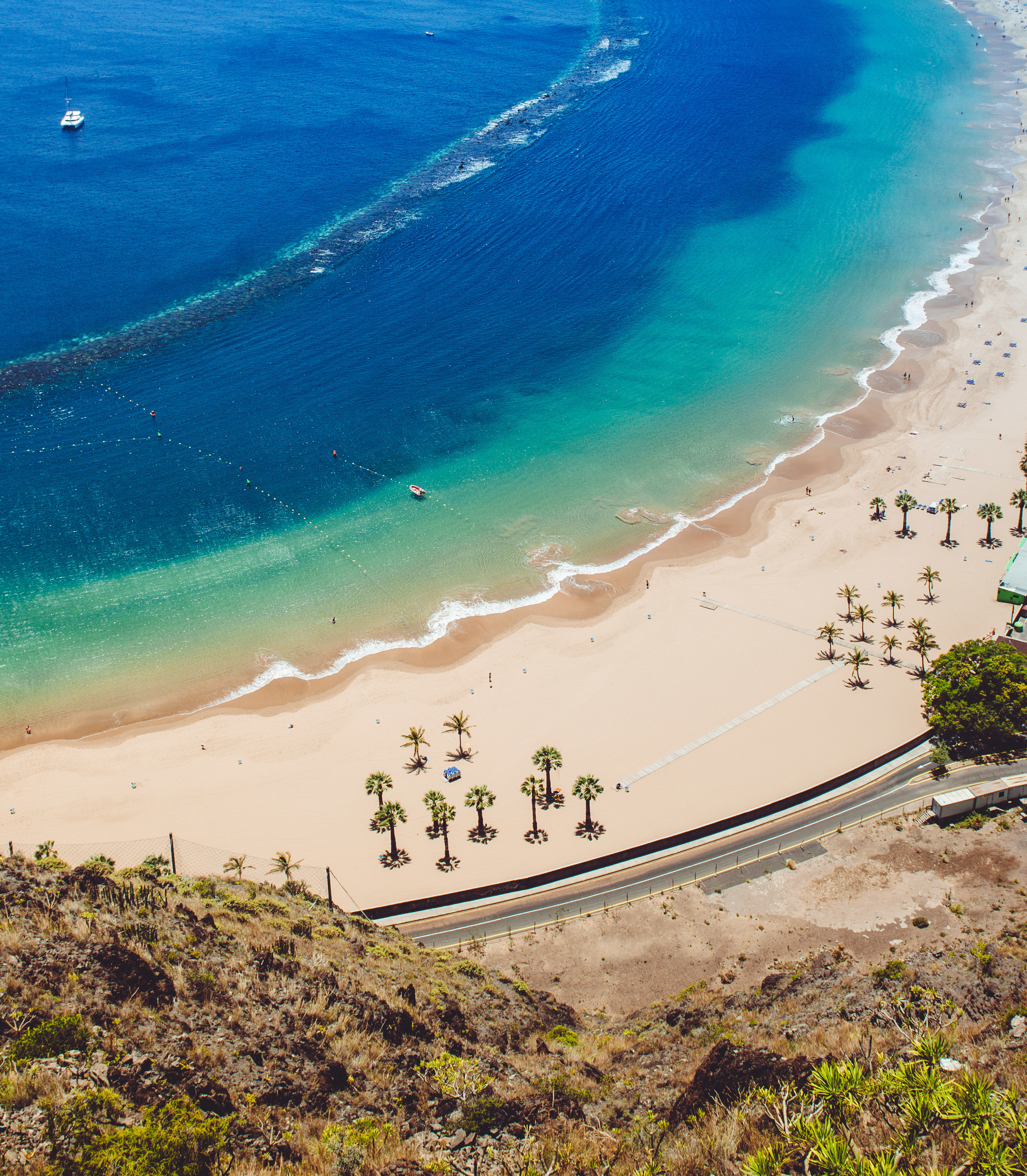 Beautiful white sand beach with turquoise blue water in the Canary Islands