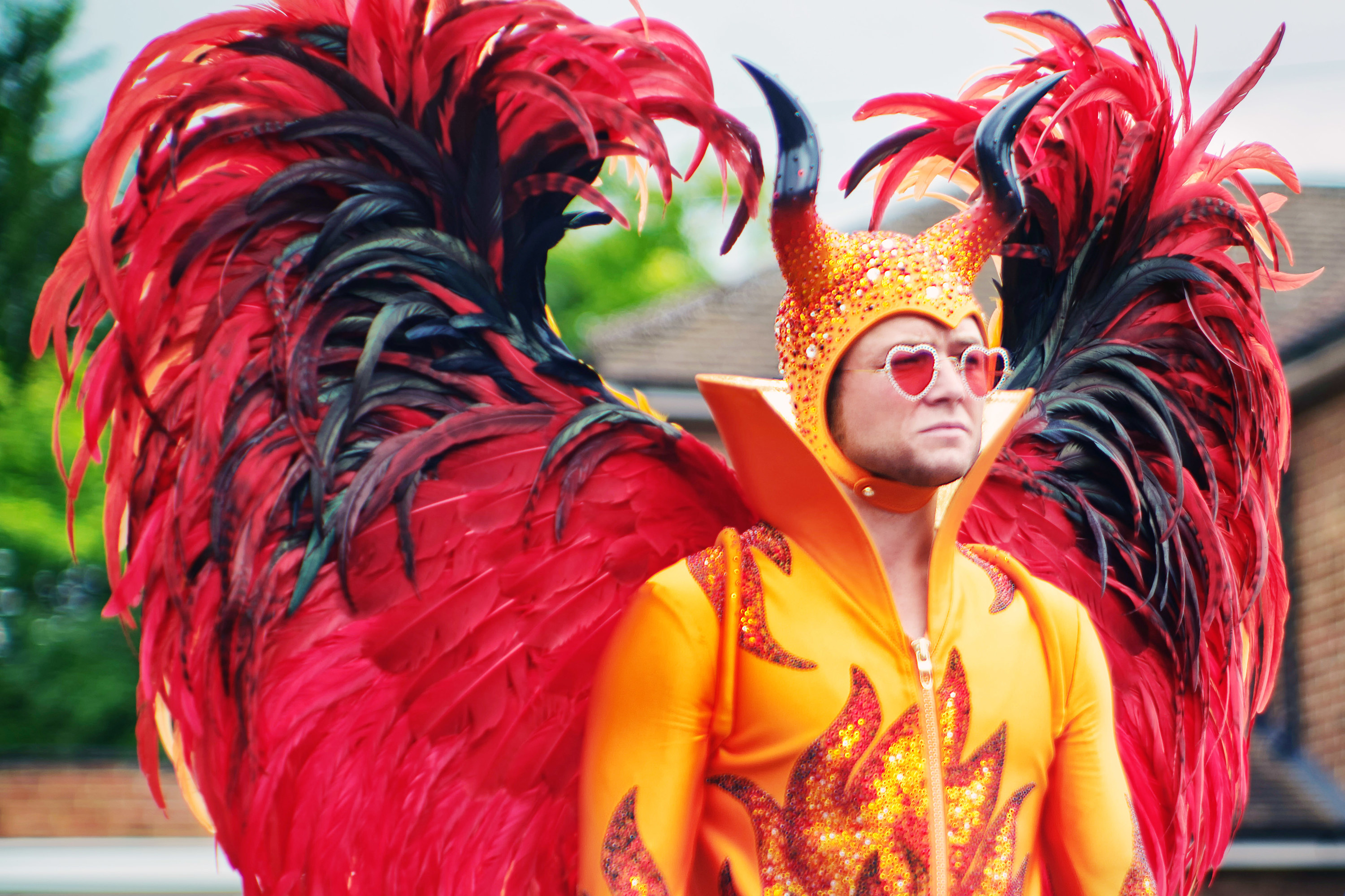 Elton John in an elaborate winged costume