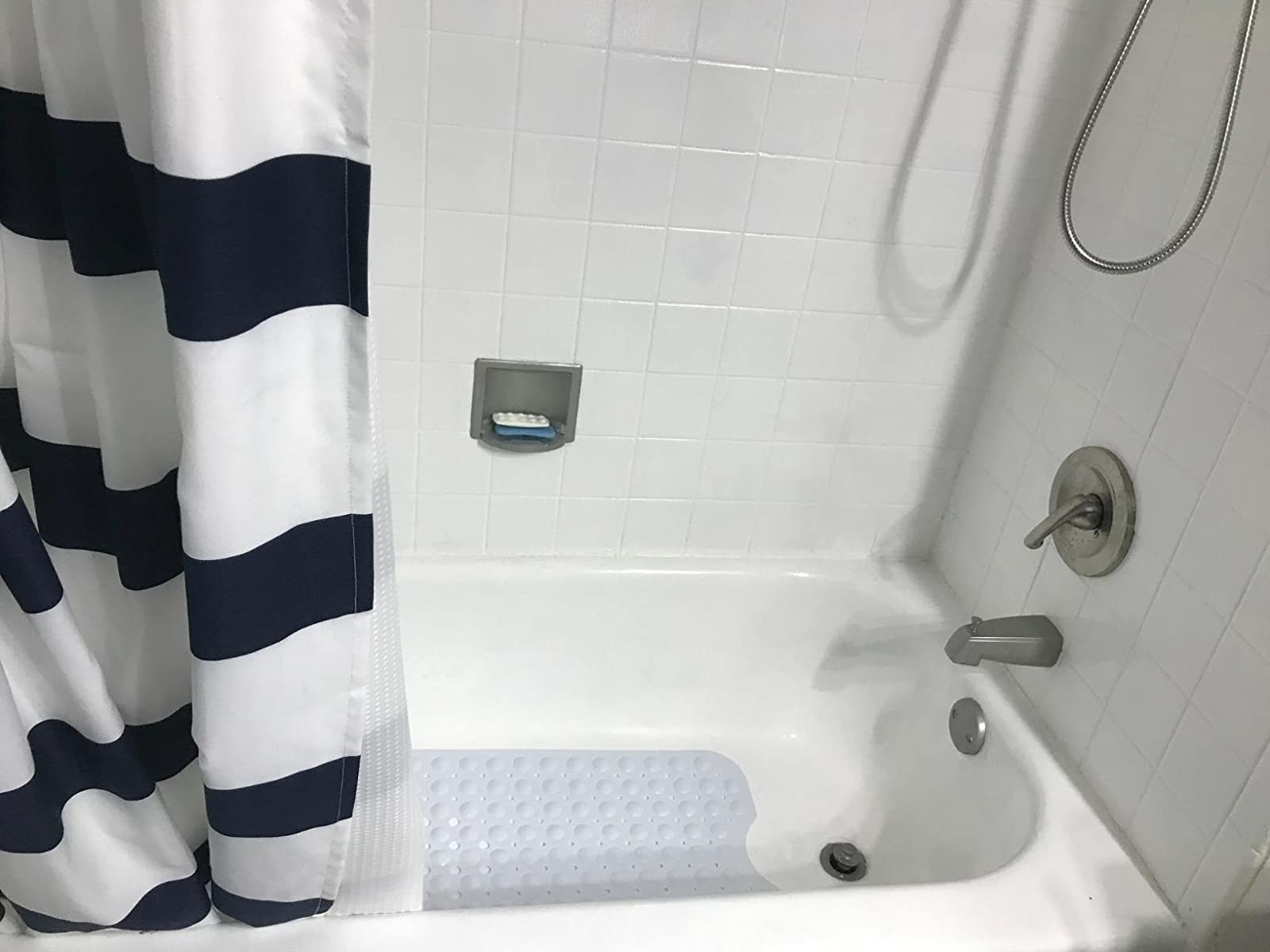 Reviewer photo of shower with bath mat