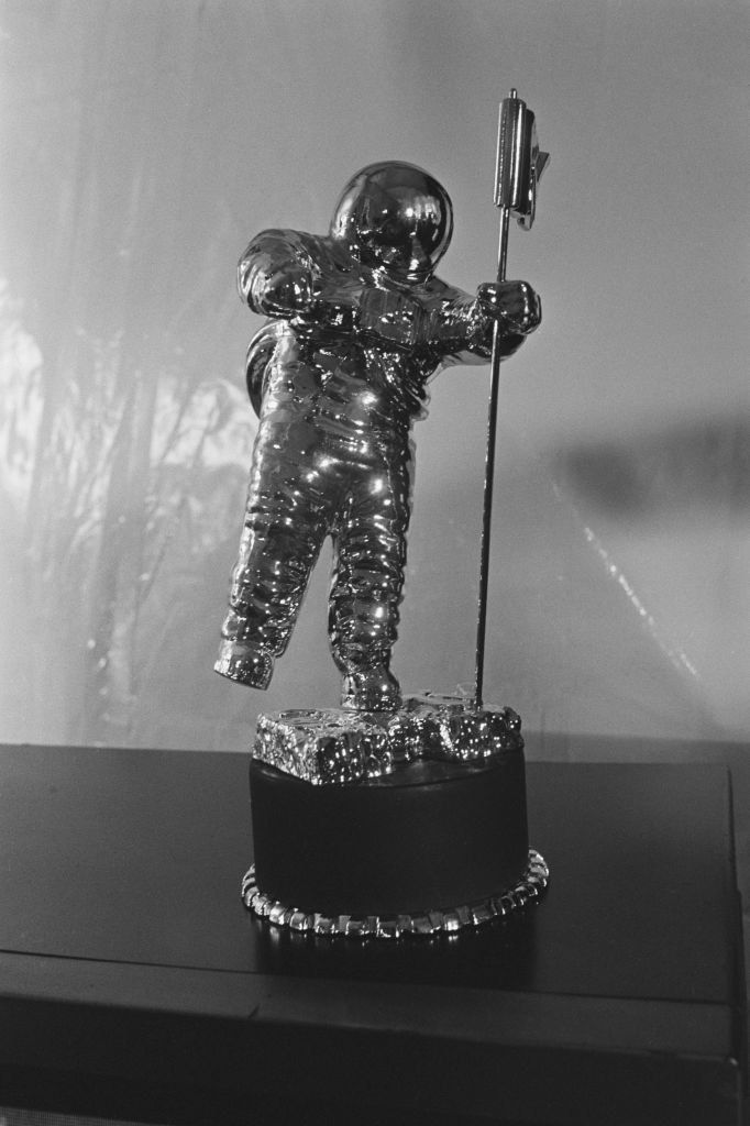 silver astronaut statuette