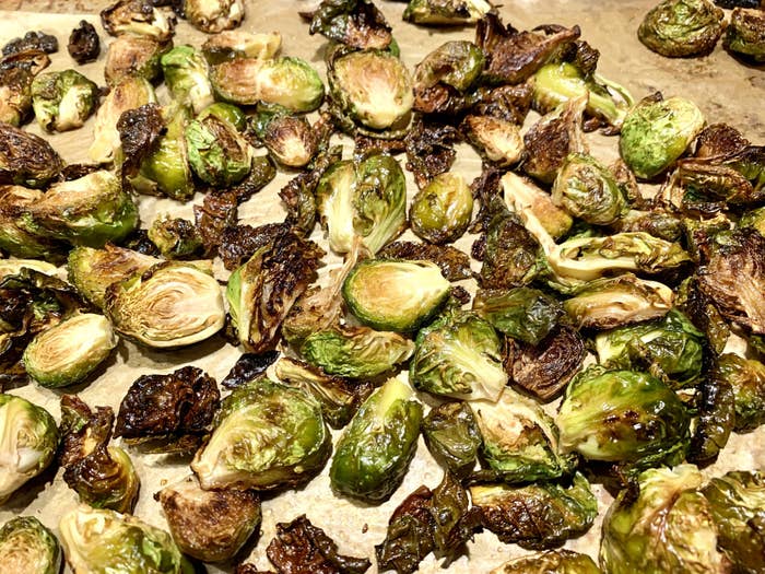 A tray fresh out of the oven of roasted Brussels sprouts