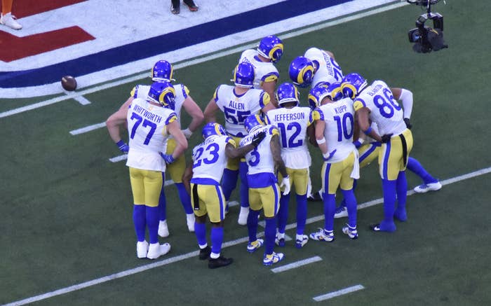 The Rams during an offensive huddle